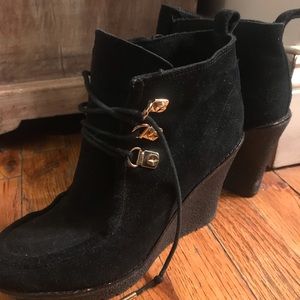Suede laceup booties to dress up apres ski